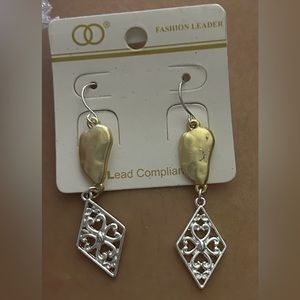 Earrings with some pears on it .